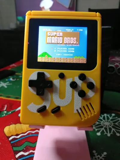 Consola retro 8 bits portátil retro SUP amarilla - miniatura 1