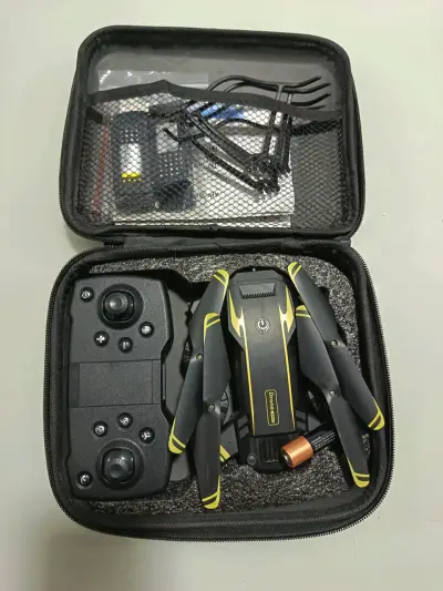 Drone plegable con control remoto y accesorios - miniatura 1