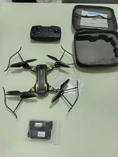 Drone plegable con control remoto y accesorios - miniatura 2
