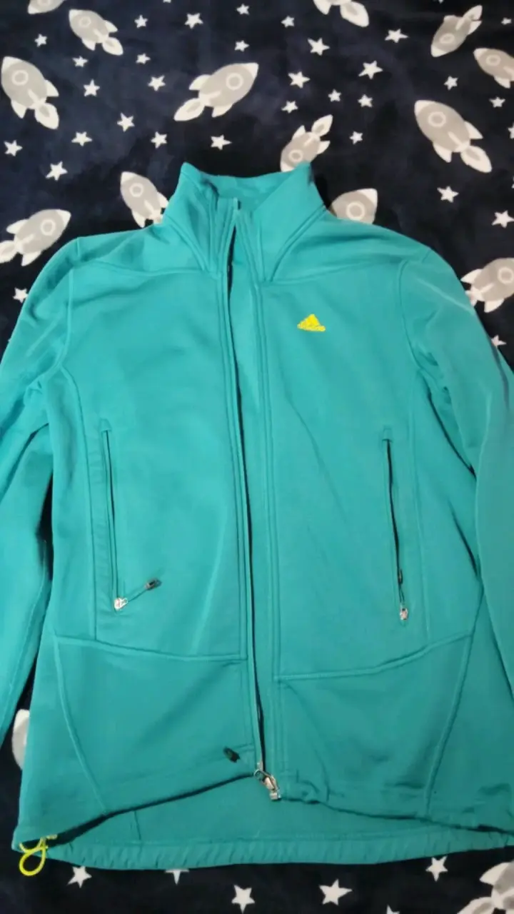 Chaqueta deportiva turquesa Adidas con cierre