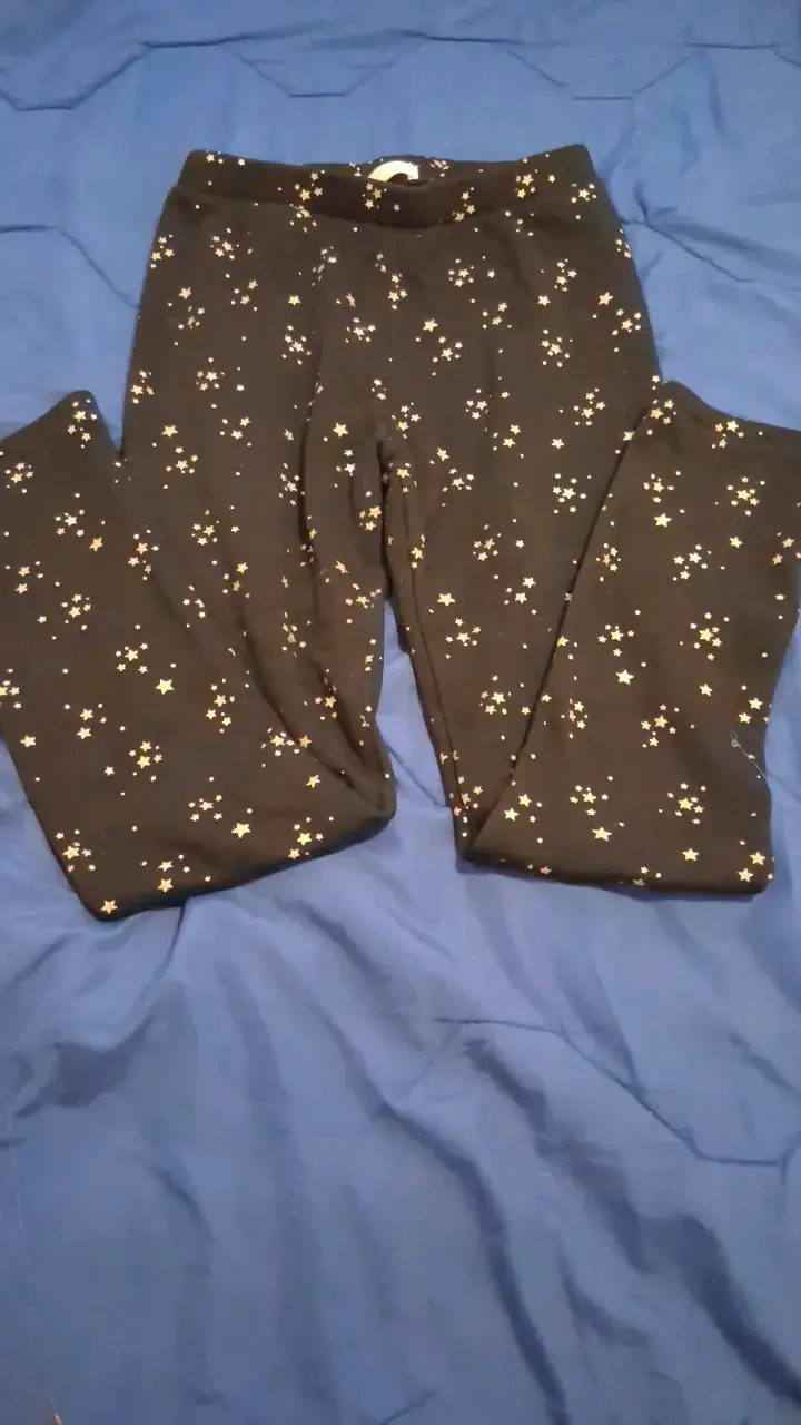 Leggings negros con estampado de estrellas - 1