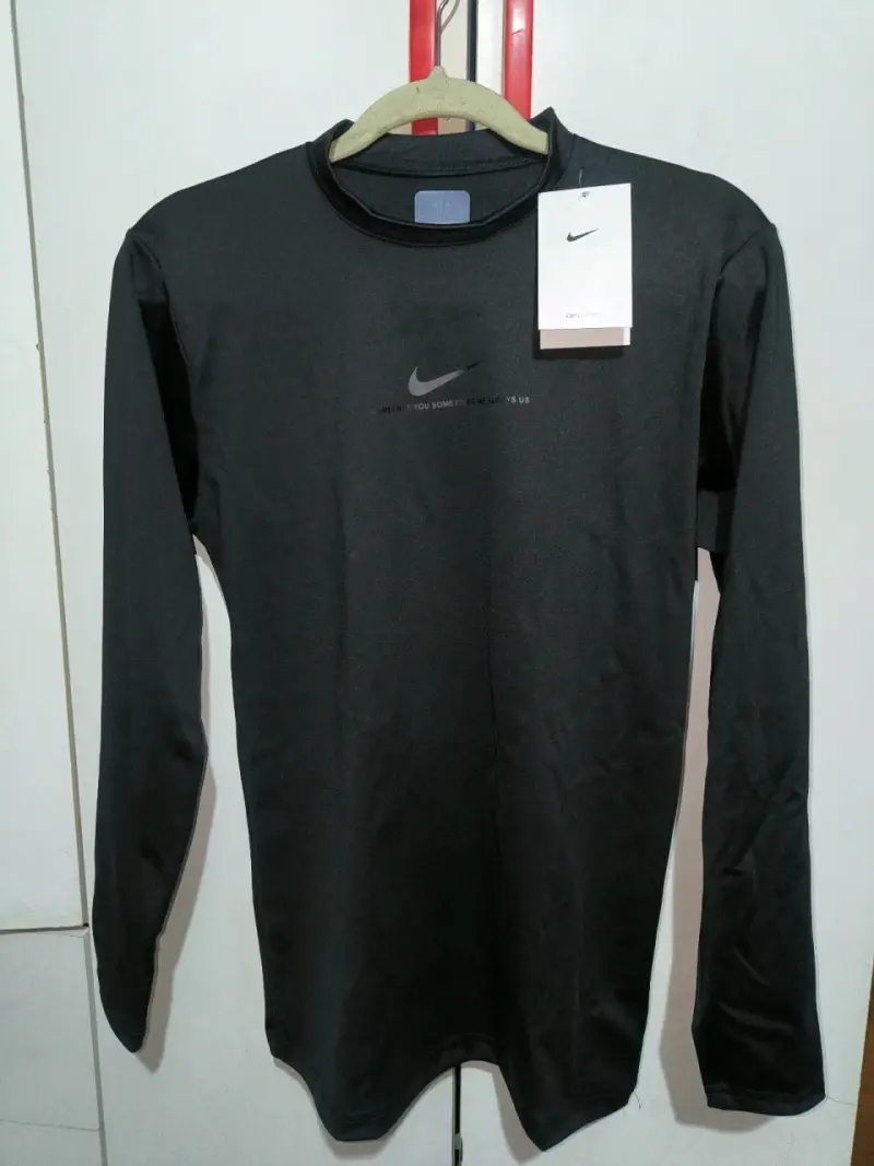 Polera Nike Nocta Dri-Fit Negra Hombre - 1