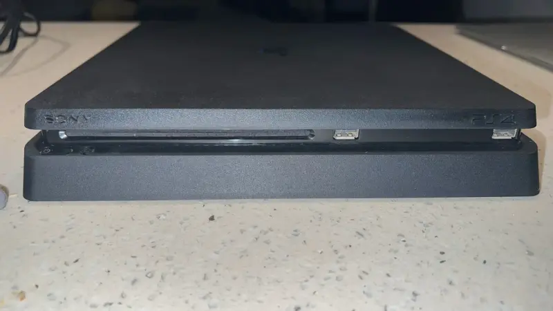 Consola PlayStation 4 Slim + 2 Controles + juegos - 4
