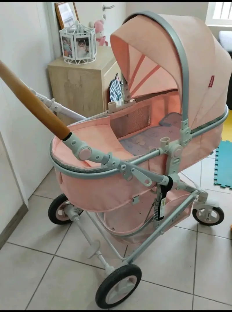 Coche de bebé rosa con capota ajustable - 2