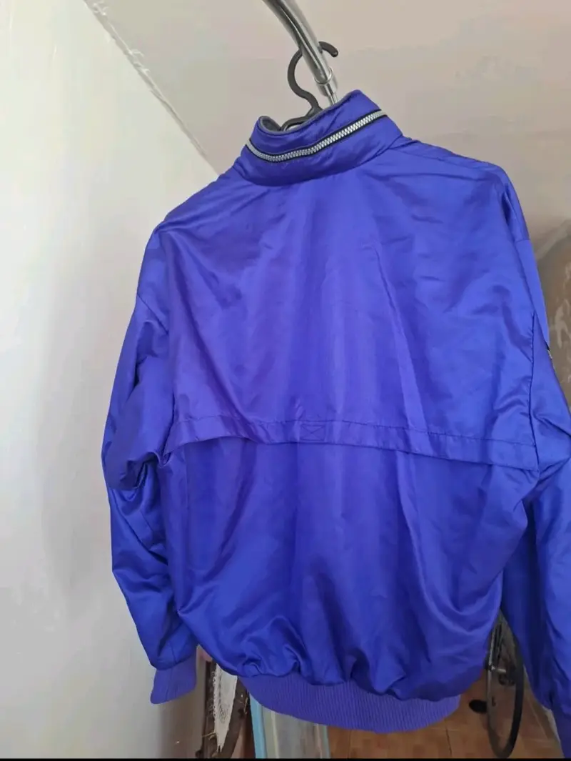 Chaqueta deportiva azul Asics con cierre - 2