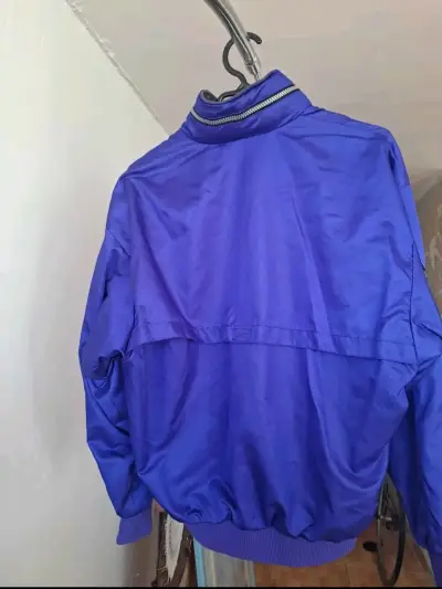Chaqueta deportiva azul Asics con cierre - miniatura 2