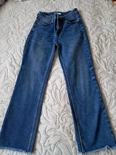 Jeans acampanados de mezclilla azul talla 30 - miniatura 1