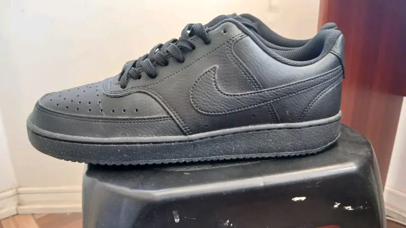 Zapatillas deportivas negras Nike en buen estado - 1