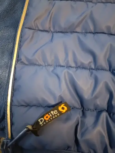Chaqueta acolchada azul con capucha - miniatura 5