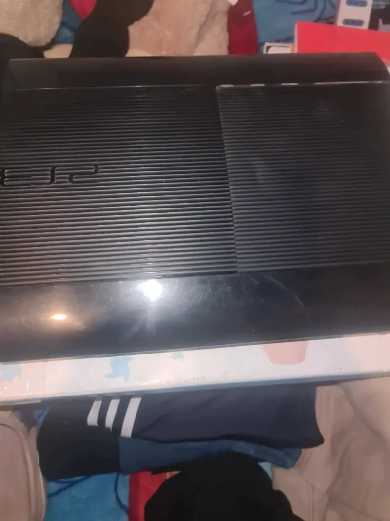 Consola PS3 con accesorios y juegos - 1