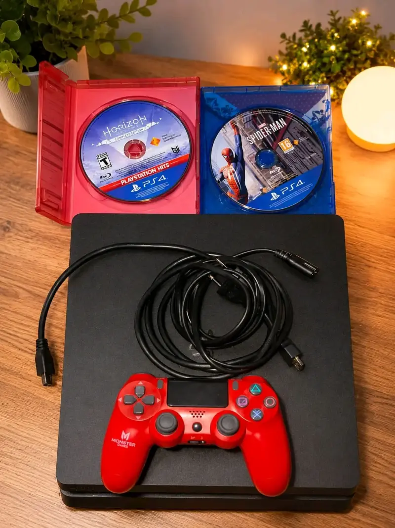 Consola PS4 con juegos Horizon y Spider-Man