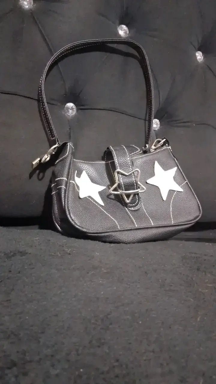 Cartera negra con estrellas blancas - 1
