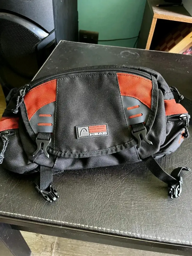 Banano deportiva negra y roja Head - 2