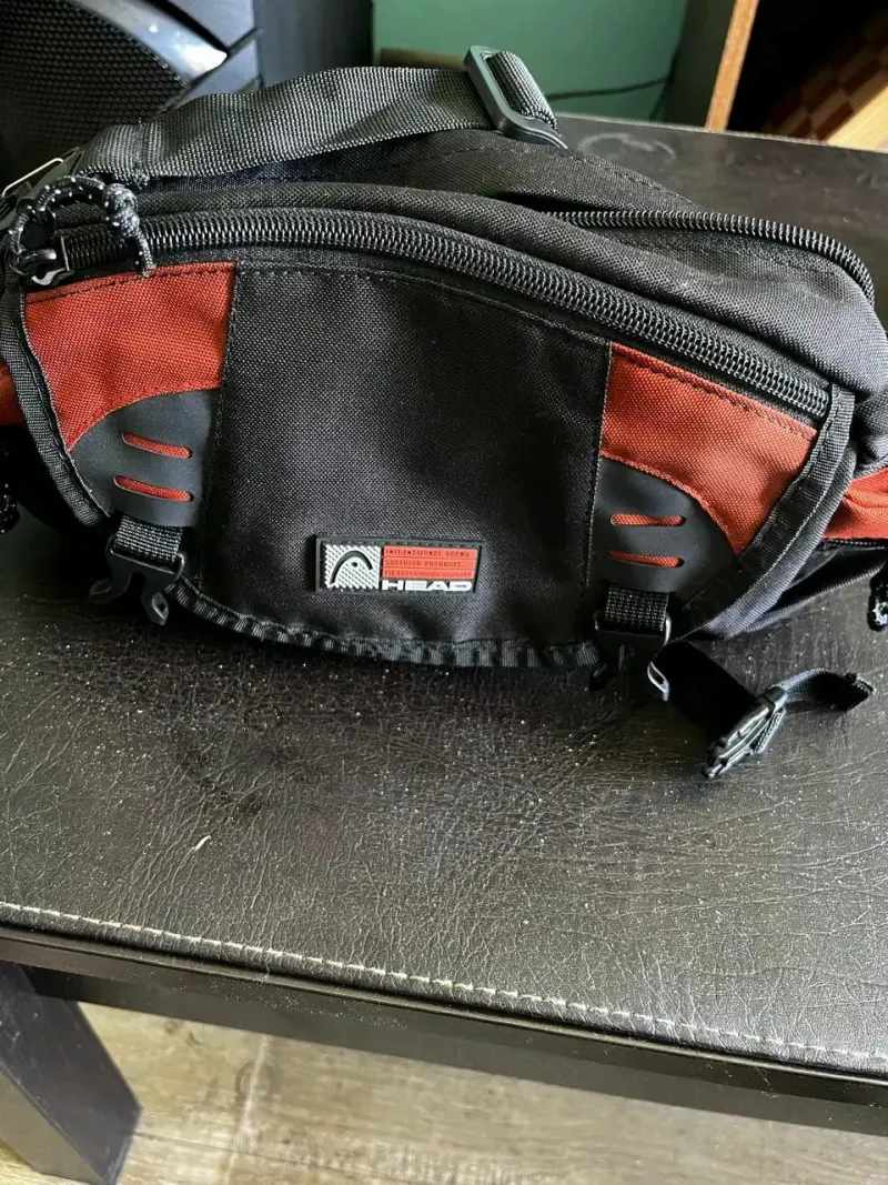 Banano deportiva negra y roja Head - 4