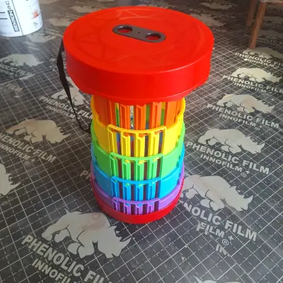 Taburete plegable de colores para camping - miniatura 1