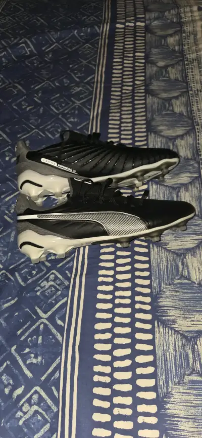 Botines de fútbol Puma King negros - miniatura 1