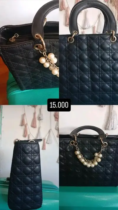 Cartera negra con diseño acolchado y perlas - miniatura 1