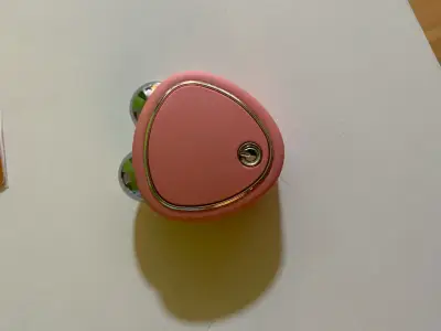 Masajeador facial eléctrico portátil rosa - miniatura 1
