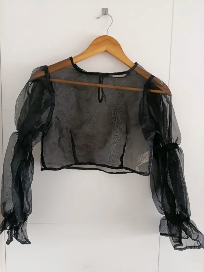 Blusa transparente negra