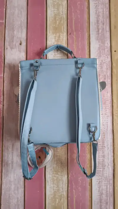 Mochila escolar azul con diseño de corazón - miniatura 2