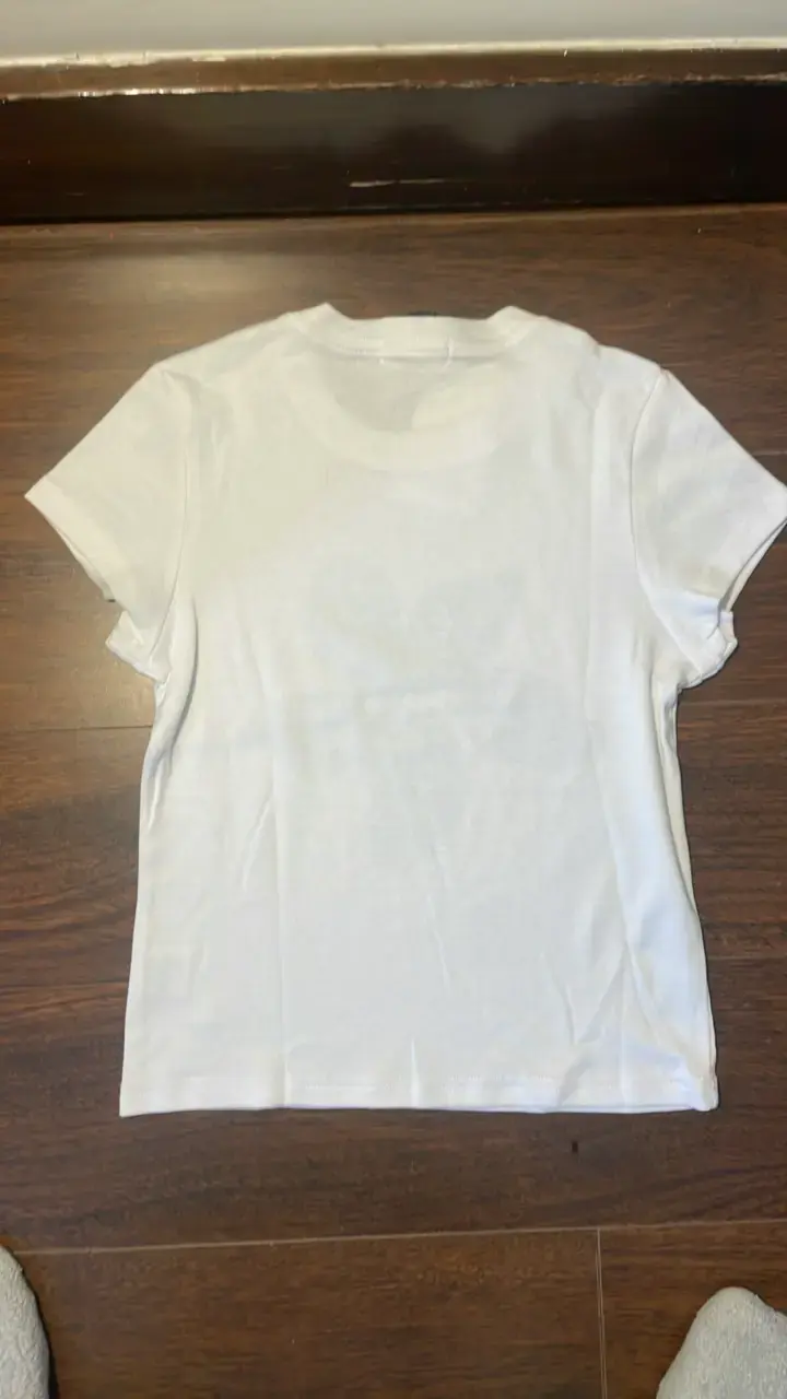 Polera Blanca con Estampado de Flor Azul - 2
