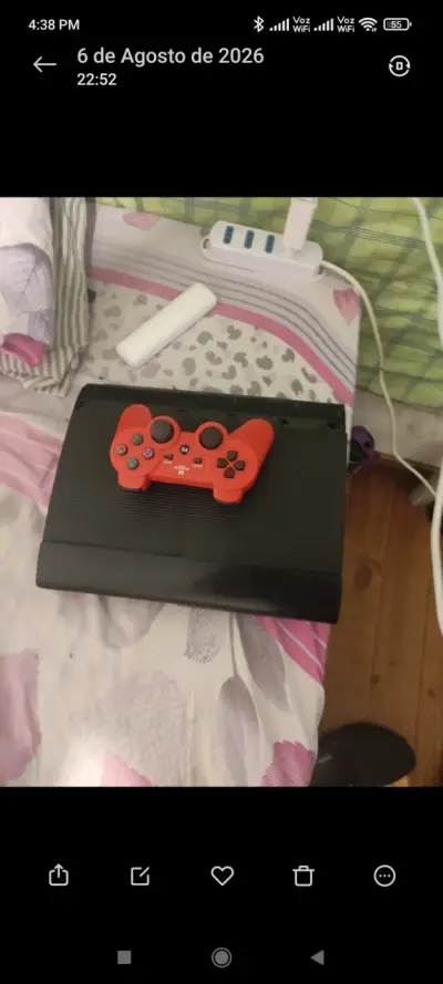 Consola PlayStation 3 con control rojo - miniatura 1