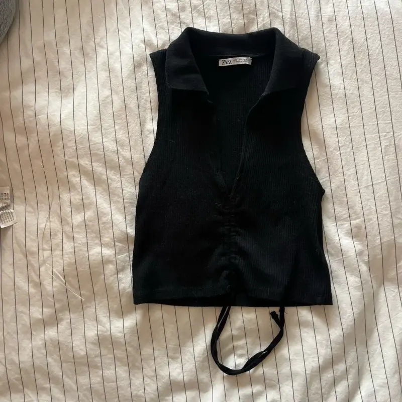 top zara con cuello camisero