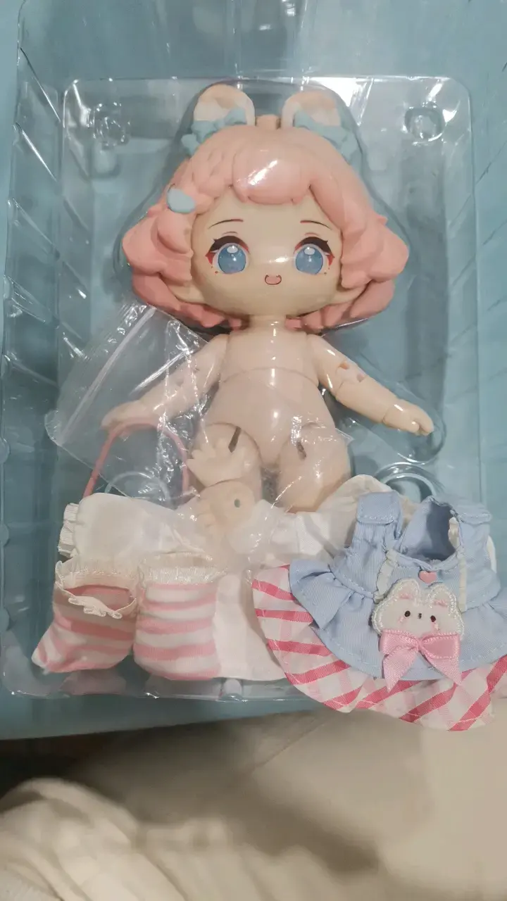 Muñeca Hani con ropa intercambiable - 2