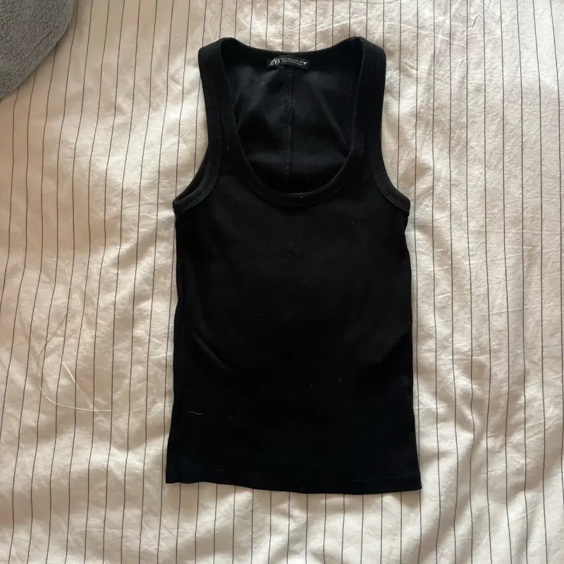Polera sin mangas básica mujer