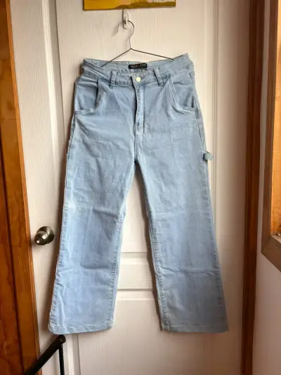 Jeans de mezclilla azul claro para mujer - miniatura 1