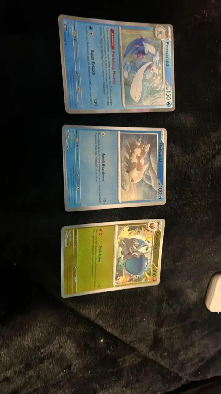 Cartas Pokémon Primarina, Relicanth y Cranidos