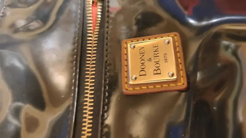 Bolso de cuero Dooney & Bourke negro y marrón - 3