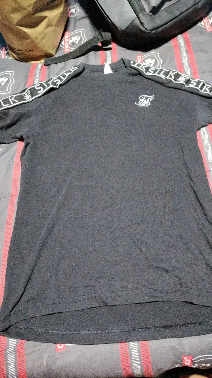 Polera siksilk negra con uso - 1