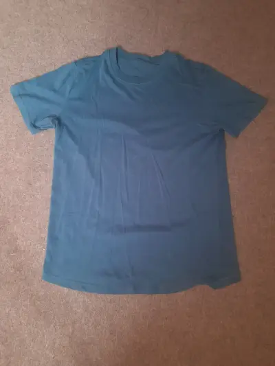 Polera azul para hombre en buen estado - miniatura 1