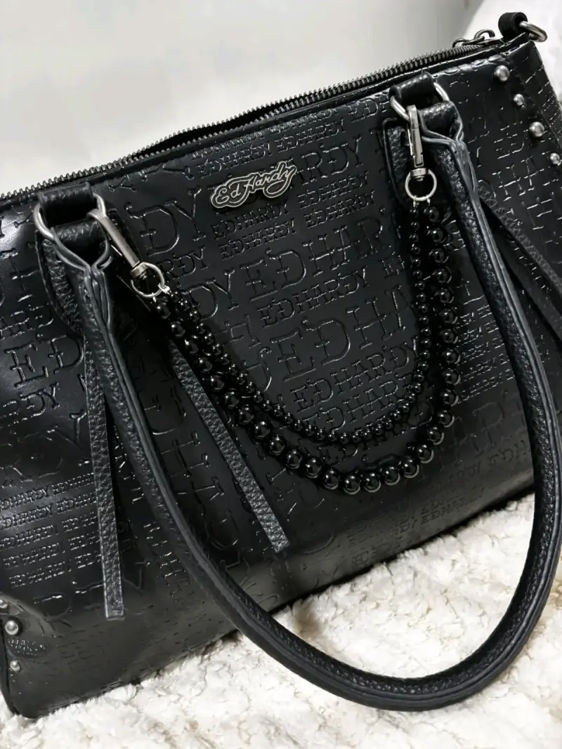 Bolso negro Ed Hardy con detalles en relieve - 1