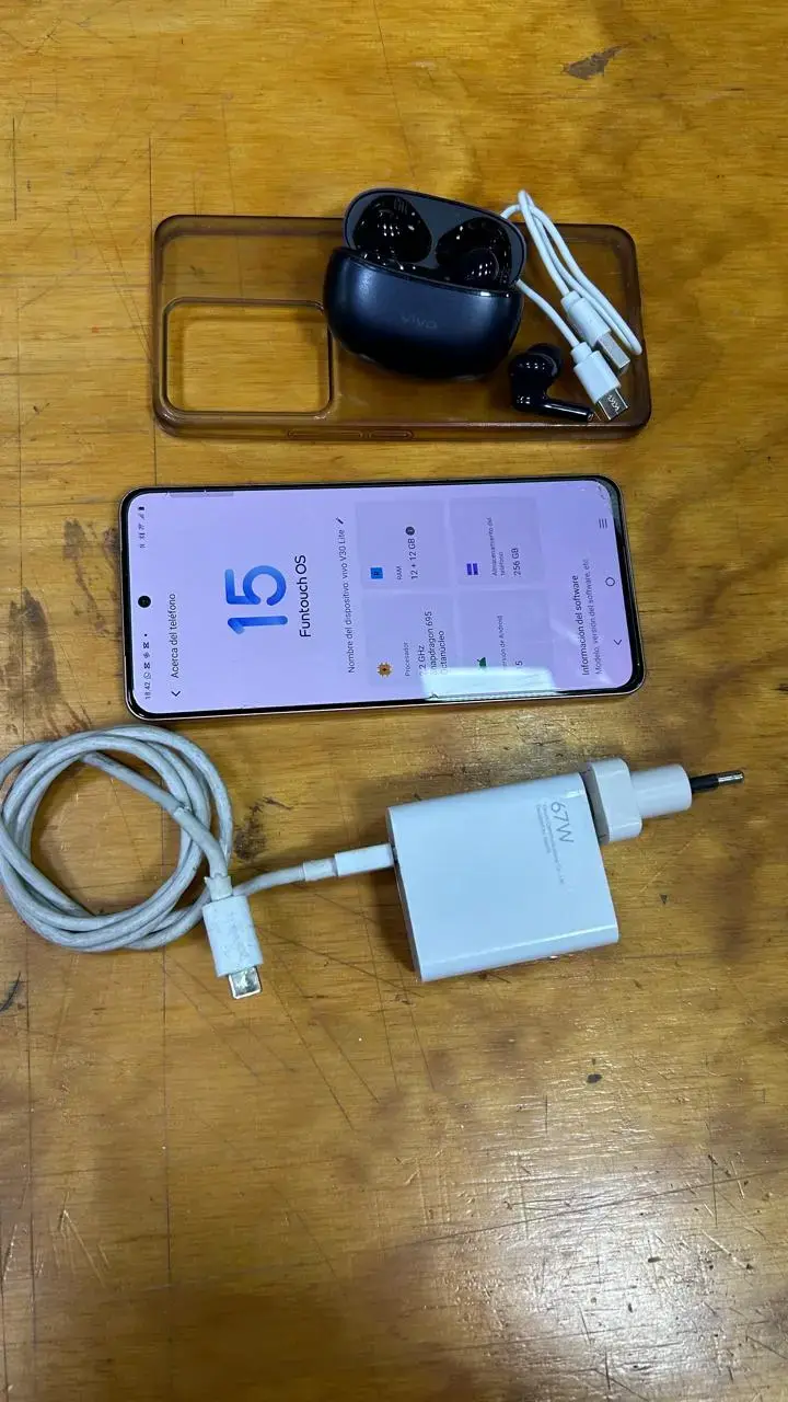 Smartphone Vivo con accesorios y audífonos - 4