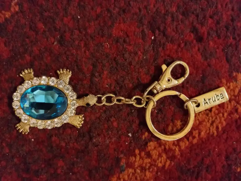 Llavero de tortuga con cristal azul
