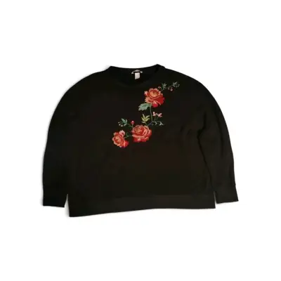 Suéter negro con bordado floral - miniatura 1