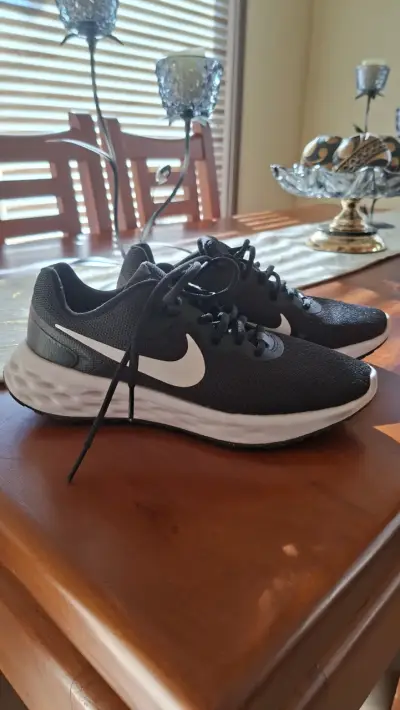 Zapatillas deportivas negras Nike Revolution - miniatura 1