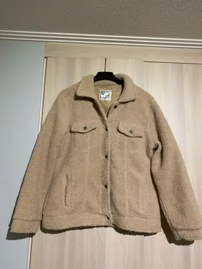Chaqueta de lana beige con bolsillos - miniatura 1