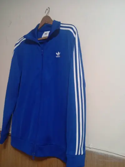 Chaqueta deportiva azul Adidas - miniatura 1