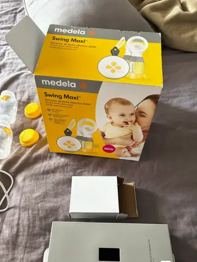 Extractor de leche eléctrico doble Medela Swing Maxi - miniatura 1