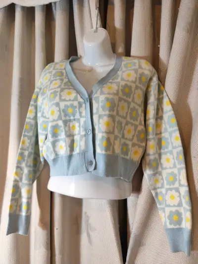 Chaleco de punto con diseño floral en tonos pastel - miniatura 1