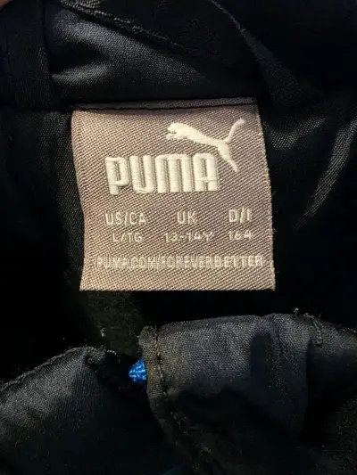 Chaqueta acolchada azul y negra Puma para hombre - miniatura 2