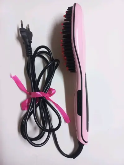 Cepillo alisador de cabello eléctrico rosa - miniatura 1
