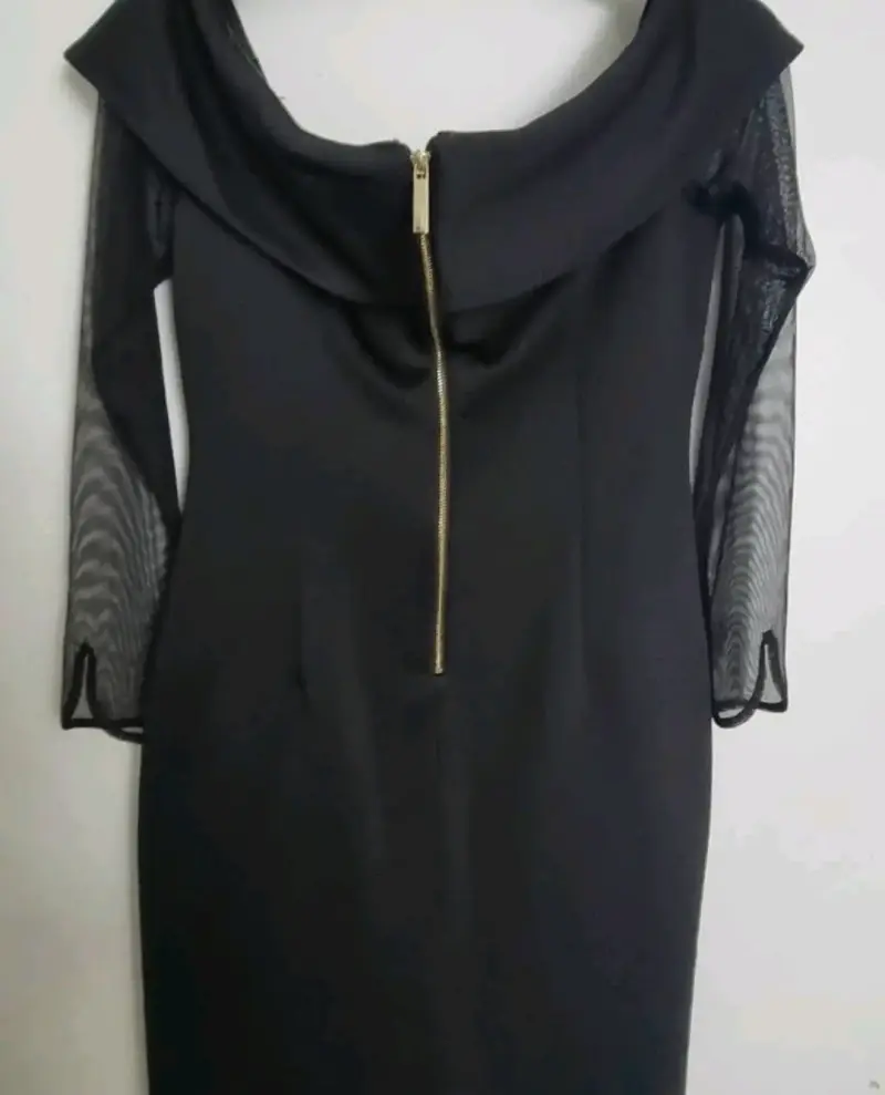 Vestido negro elegante con mangas transparentes - 3