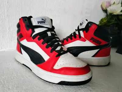 Zapatillas deportivas Puma rojas y negras - miniatura 1