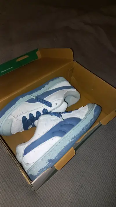 Zapatillas deportivas blancas y azules Puma - miniatura 1