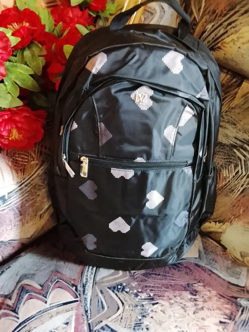 Mochila estampada con diseño floral y geométrico