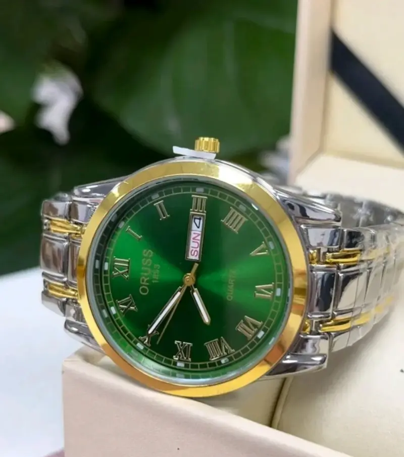 Reloj de pulsera Oriss 1853 bicolor con esfera verde